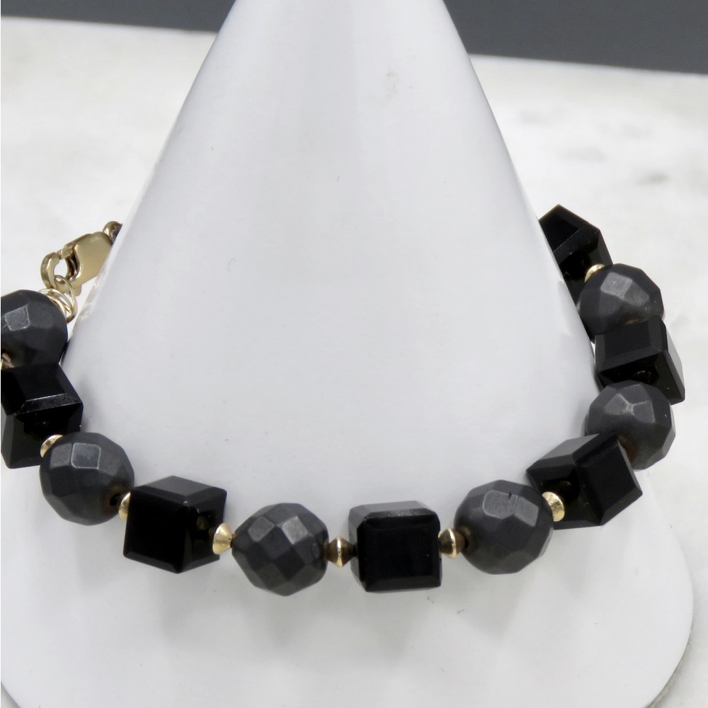 Cubed Beveled Onyx, Hematite and 14Kt gold bicone Bracelet